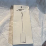 Apple Lightning To Usb Camera Adapter For Ipad Iphone MD821ZM/A New Open Box. Price: $14.00.