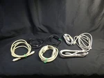 Lot Of Seven Serial Cables Six Generic 8 Pin & One Apple 590-0413-A Used. Price: $25.00.